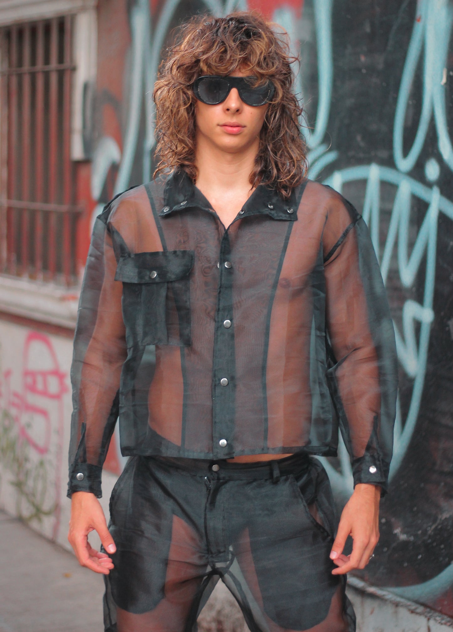 Chamarra transparente negra